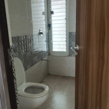 Bathroom in 2 BHK Apartment at Triveni Bhoomi Harmony, Kamothe Sector 18 – for Sale