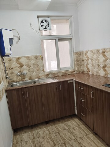 Kitchen in 3 BHK Apartment at Amrapali Leisure Park, Amrapali Leisure Valley – for Rent