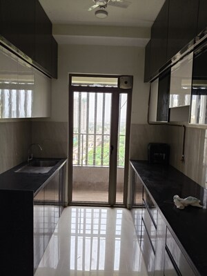 Kitchen in 4 BHK Apartment at Kalpataru Paramount, Kapur Bawdi – for Sale