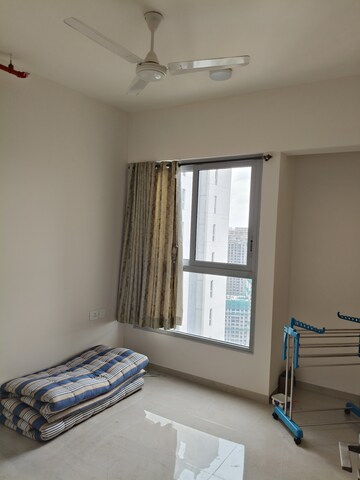 Room in 2 BHK Apartment at Piramal Vaikunth, Balkum Pada – for Rent