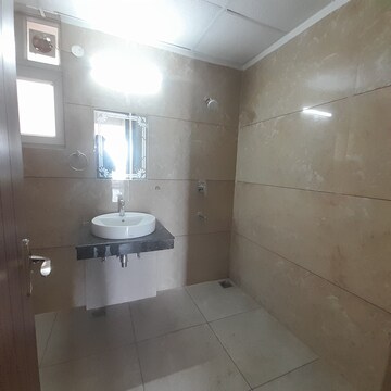 Bathroom in 4 BHK Apartment at International Airport Road – for Rent