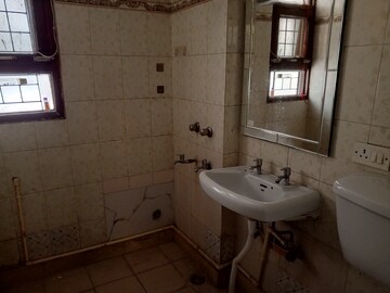 Bathroom in 3 BHK Apartment at Prerna Apartment, Sector 56 – for Rent