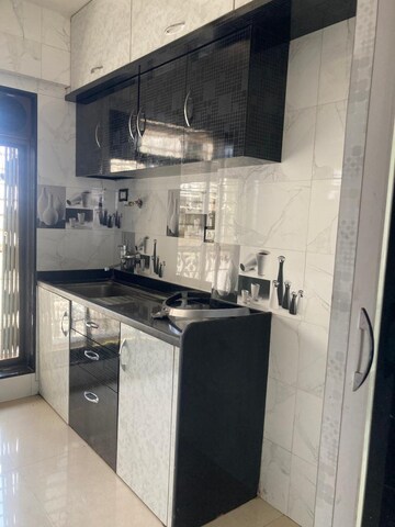 Kitchen in 3 BHK Apartment at Paradise Sai Spring, Kharghar Sector 35g – for Sale