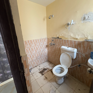 Bathroom in 2 BHK Apartment at Apex Our Homes, Garoli Kalan – for Rent