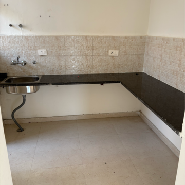 Kitchen in 2 BHK Apartment at Signature The Millennia 2, Garoli Kalan – for Rent