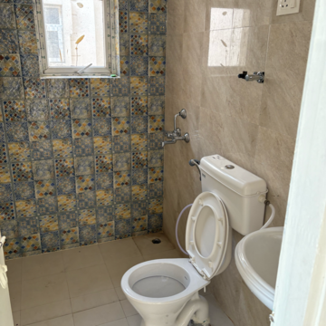 Bathroom in 2 BHK Apartment at Signature The Millennia 2, Garoli Kalan – for Rent