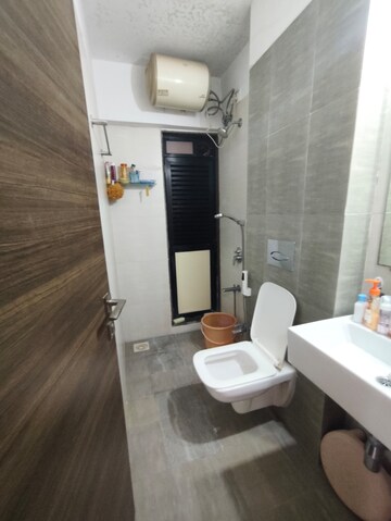 Bathroom in 1 BHK Apartment at Kanakia Rainforest, Andheri East – for Rent