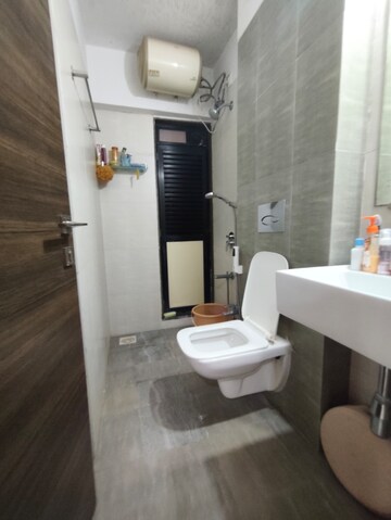 Bathroom in 1 BHK Apartment at Kanakia Rainforest, Andheri East – for Rent
