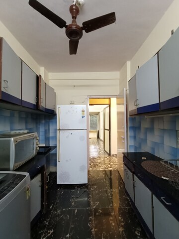 Kitchen in 2 BHK Apartment at Mangal Orchid Chs, Andheri West – for Rent