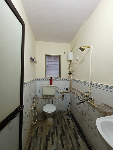 Bathroom in 2 BHK Apartment at Mangal Orchid Chs, Andheri West – for Rent