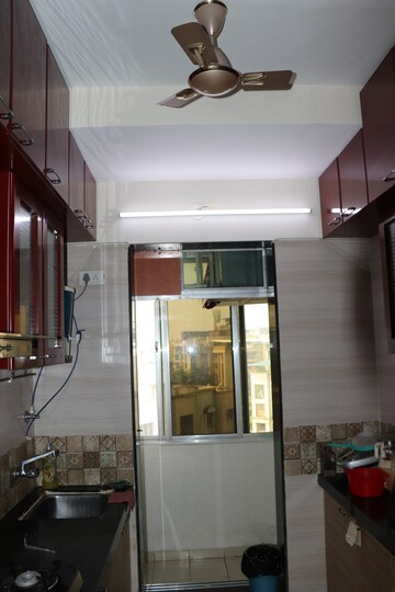 Kitchen in 2 BHK Apartment at Mira Road East – for Sale