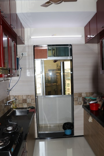 Kitchen in 2 BHK Apartment at Mira Road East – for Sale