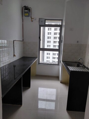 Kitchen in 1 BHK Apartment at Kalpataru Immensa, Kolshet Road – for Rent