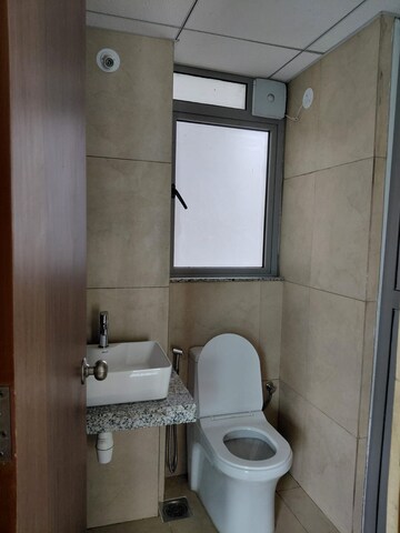 Bathroom in 1 BHK Apartment at Kalpataru Immensa, Kolshet Road – for Rent