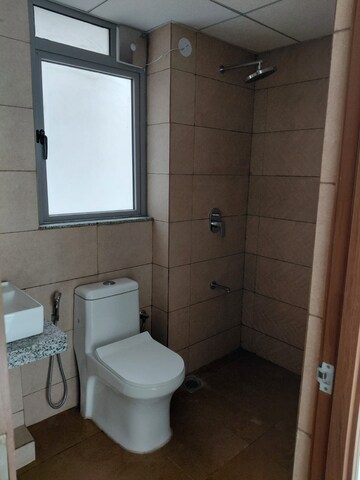 Bathroom in 1 BHK Apartment at Kalpataru Immensa, Kolshet Road – for Rent