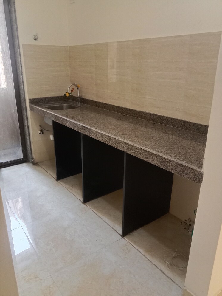 Kitchen, sunteck-west-world 1 Bedroom 392 Sq.Ft. Apartment In Tivri Palghar 8949912
