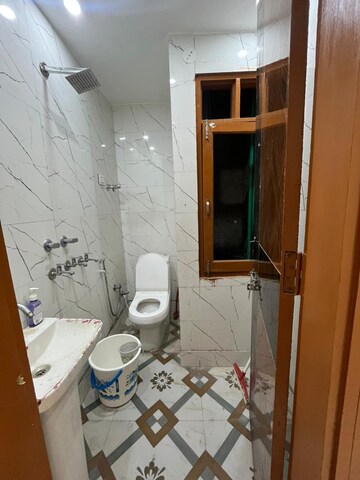 Bathroom in 1 BHK Builder Floor at Dwarka Mor – for Rent