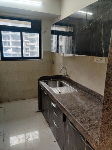 Kitchen in 2 BHK Apartment at Sunteck Avenue 2, Goregaon West – for Rent