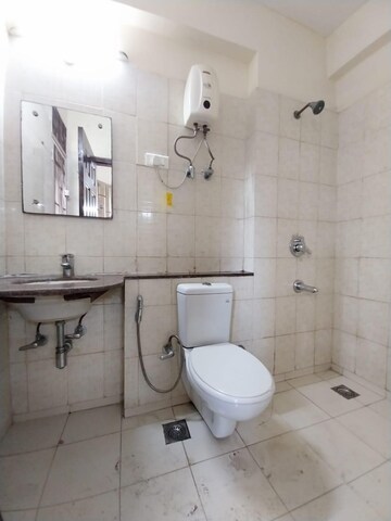 Bathroom in 3 BHK Builder Floor at Unitech Woodstock Floors, Sector 50 – for Rent