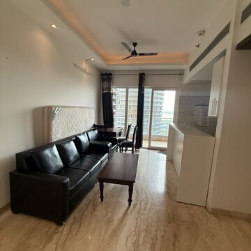 Living Room in 2 BHK Apartment at Supertech Supernova Nova Residences, Sector 94 – for Rent