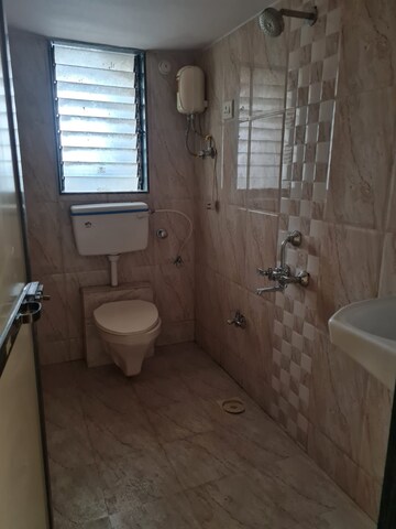 Bathroom in 2 BHK Apartment at Mangal Krupa, Malad East – for Sale