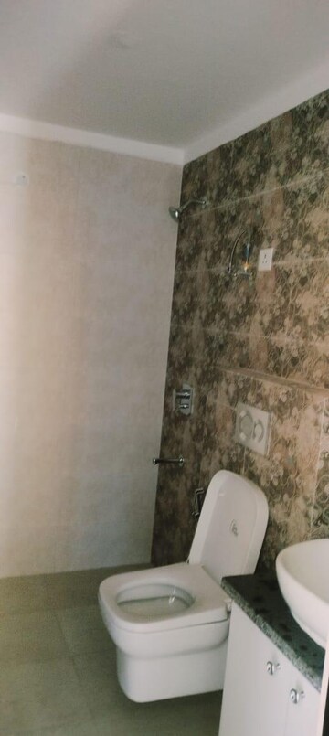 Master Bedroom in 4 BHK Apartment at Paradigm Business Hermitage Park, Dhakoli – for Rent
