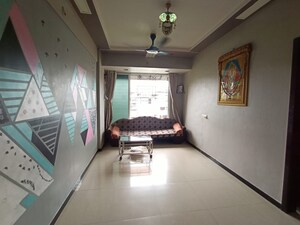 Living Room in 2 BHK Apartment at Kopar Khairane – for Sale