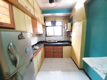Kitchen in 2 BHK Apartment at Riddhi Siddhi Complex Goregaon, Goregaon West – for Rent