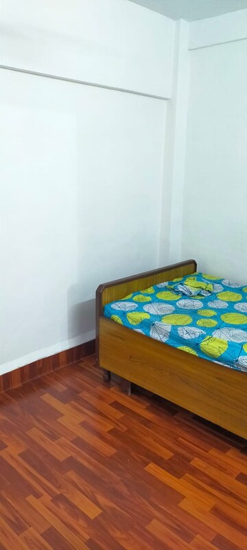 Bedroom in 1 BHK Apartment at Gokuldham Saidham CHS, Goregaon East – for Rent