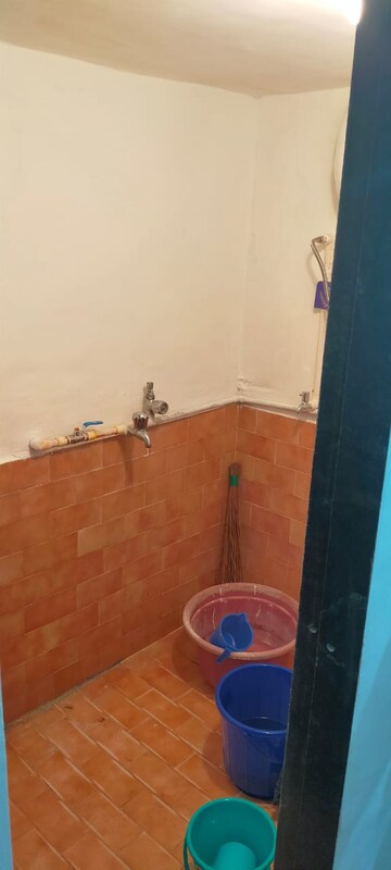 Bathroom in 1 BHK Apartment at Gokuldham Saidham CHS, Goregaon East – for Rent
