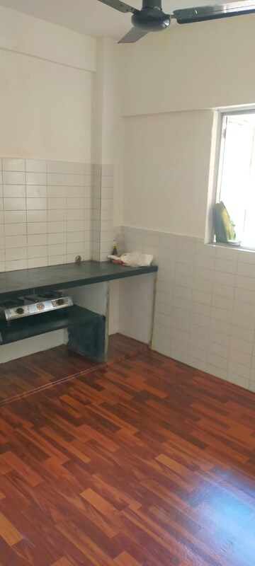 Kitchen in 1 BHK Apartment at Gokuldham Saidham CHS, Goregaon East – for Rent