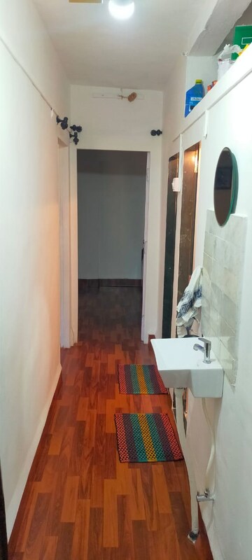 Bathroom in 1 BHK Apartment at Gokuldham Saidham CHS, Goregaon East – for Rent