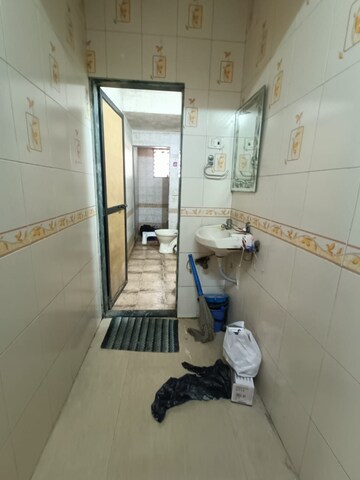 Bathroom in 1 BHK Apartment at Gokuldham Saidham CHS, Goregaon East – for Rent