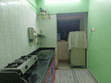 Kitchen in 1 BHK Apartment at Gokuldham Saidham CHS, Goregaon East – for Rent