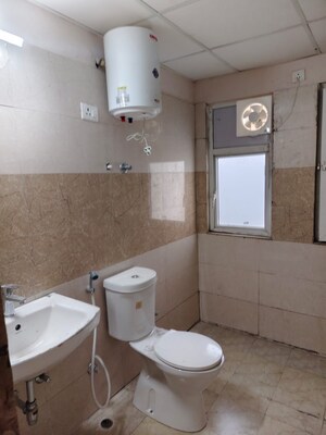Bathroom in 3 BHK Apartment at Amrapali Golf Homes, Sector 4 Greater Noida – for Sale