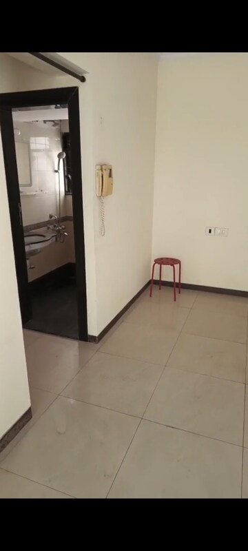 Bathroom in 1 BHK Apartment at Rustomjee Central Park, Andheri East – for Rent