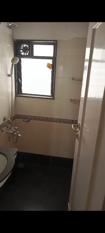 Bathroom in 1 BHK Apartment at Rustomjee Central Park, Andheri East – for Rent