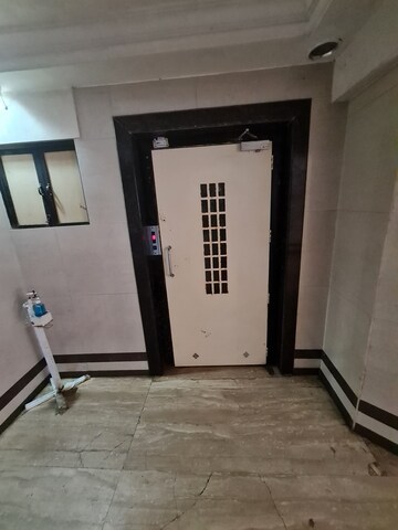 Building Lobby in 3 BHK Apartment at Charmee Enclave, Vile Parle East – for Rent