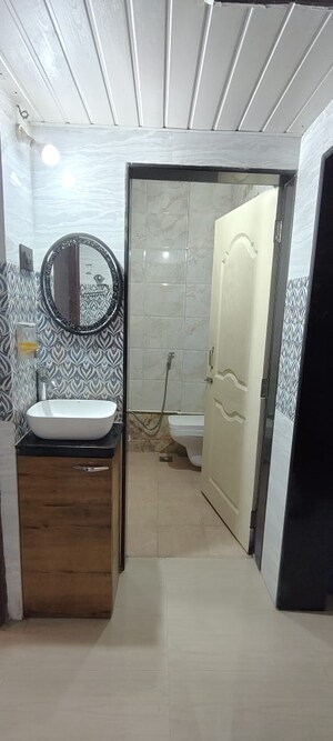 Bathroom in 1 BHK Apartment at Seawoods Sector 36 – for Sale