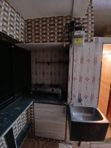 Kitchen in Studio Apartment at Mhada Vanrai Colony, Goregaon East – for Rent