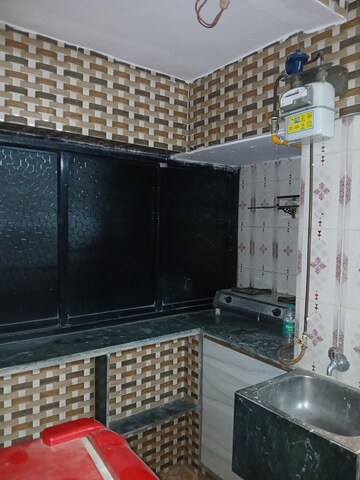 Kitchen in Studio Apartment at Mhada Vanrai Colony, Goregaon East – for Rent