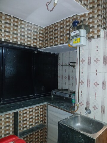 Kitchen in Studio Apartment at Mhada Vanrai Colony, Goregaon East – for Rent