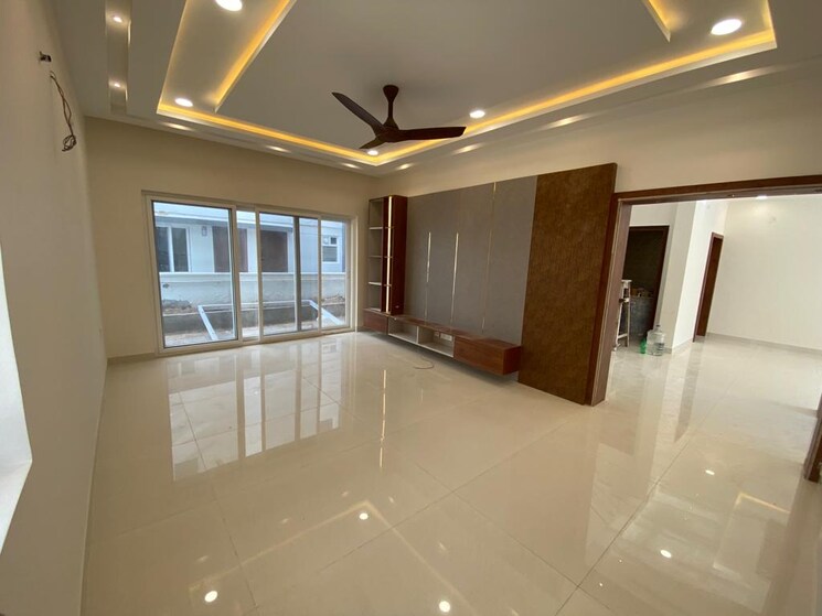 Living Room, visions-urjith 4 Bedroom 4535 Sq.Ft. Villa In Tellapur Hyderabad 8950314