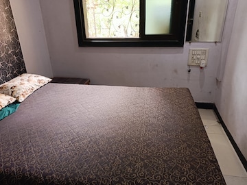 Bedroom in 1 BHK Apartment at Nagari Niwara CHS, Goregaon East – for Rent