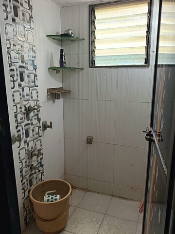 Bathroom in 1 BHK Apartment at Nagari Niwara CHS, Goregaon East – for Rent