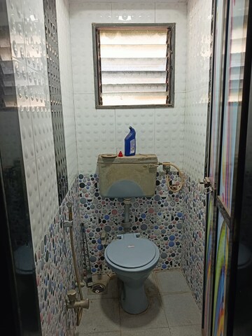 Bathroom in 1 BHK Apartment at Nagari Niwara CHS, Goregaon East – for Rent