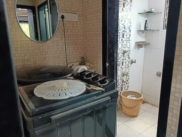 Bathroom in 1 BHK Apartment at Nagari Niwara CHS, Goregaon East – for Rent