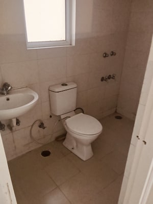 Bathroom in 2 BHK Apartment at Wave Dream Homes, Wave City – for Rent