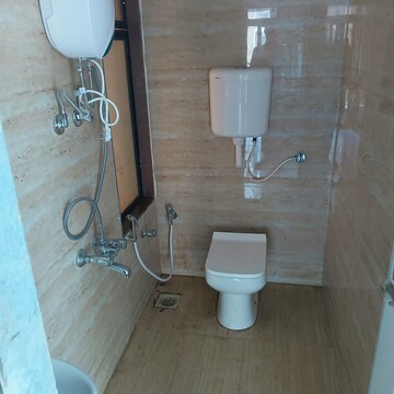 Bathroom in 1 BHK Apartment at Shellproof Gladiolus Tower, Vasai East – for Rent