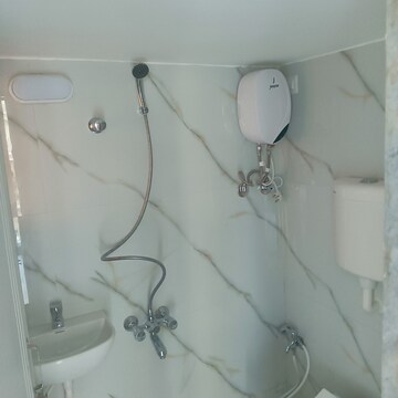 Bathroom in 1 BHK Apartment at Shellproof Gladiolus Tower, Vasai East – for Rent